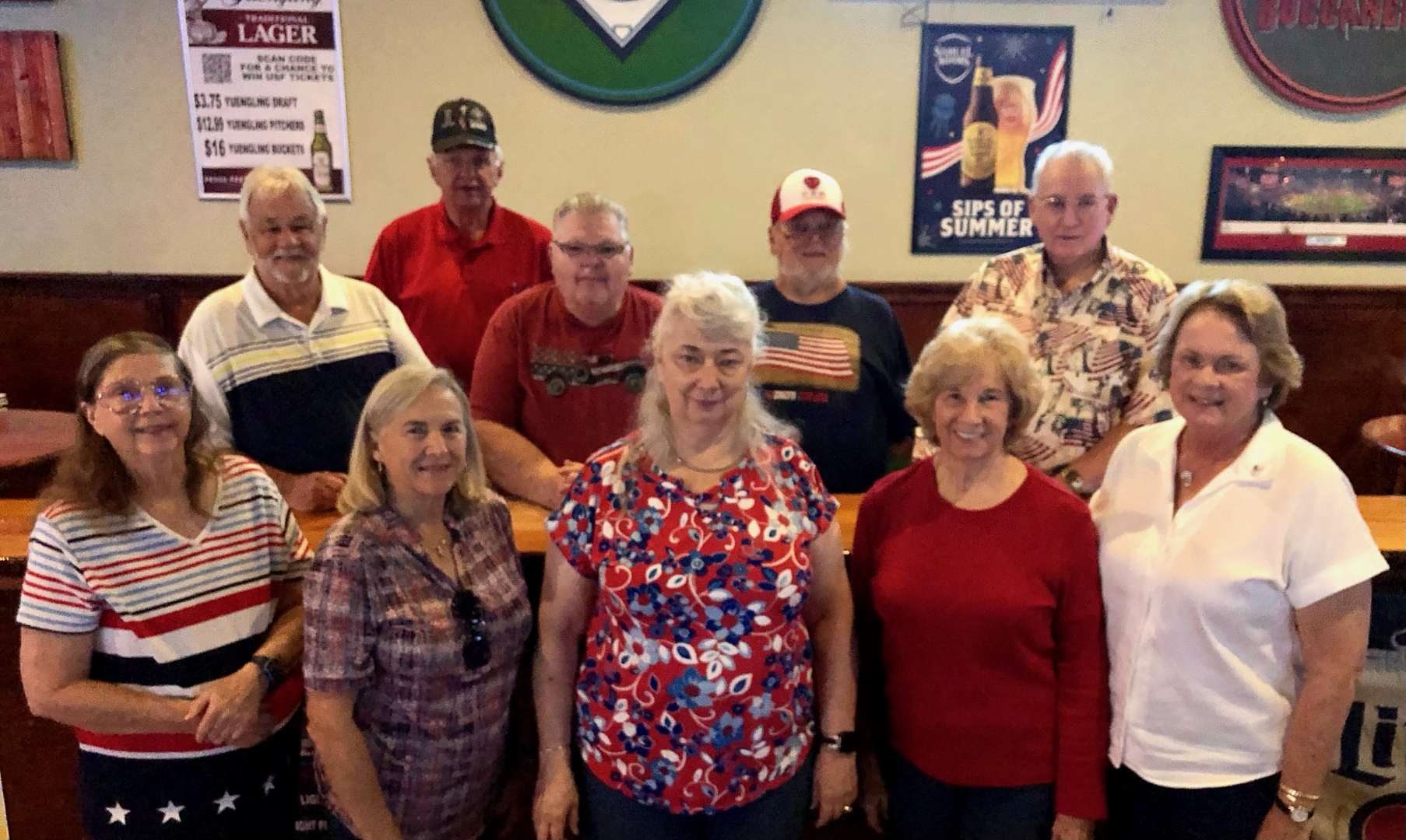 L/R Men: Ronnie Mullaney, Jim Garrett (Donna’s husband), Donald Caraway, Larry St. Charles, Bob Bridgmon.  L/R Ladies: Betty Kay Hall, Peggy Walden Farkas, Lynda Caraway (Donald’s wife), Donna Baker-Wilkes, Ruby (Perkins) Wall///     November 11, 2024